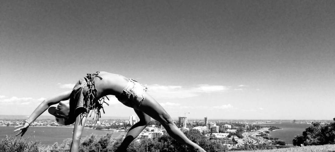 Collette Davis of The Mat Movement practicing yoga asana in Perth Botanical Gardens.