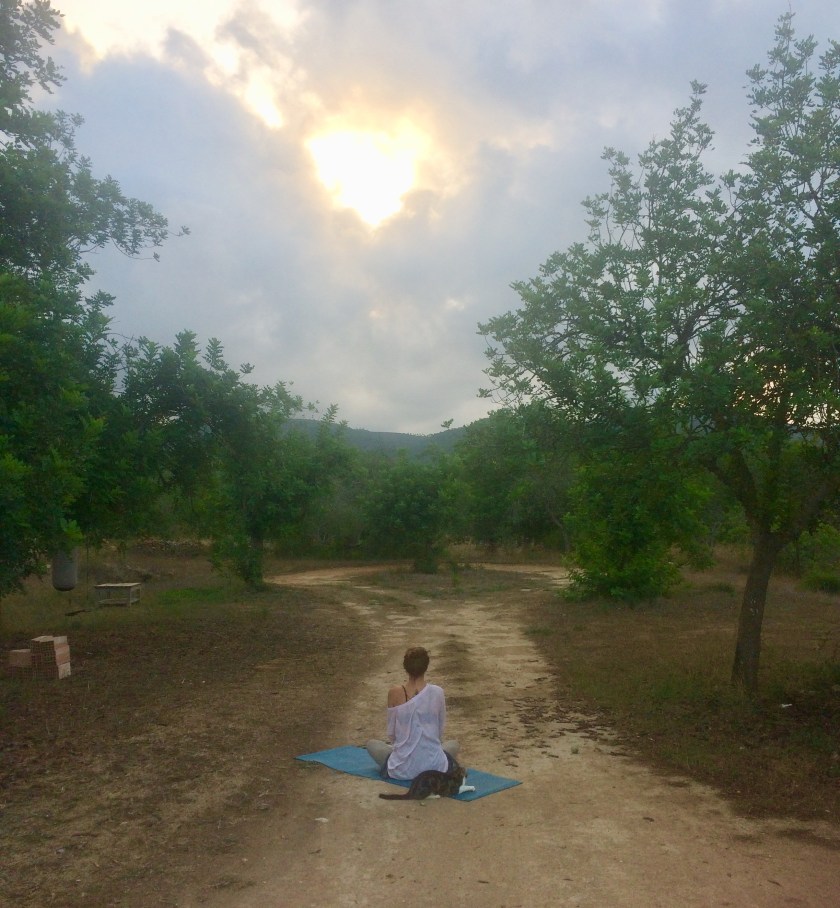 Collette Davis of www.thematmovement.com meditating in Ibiza